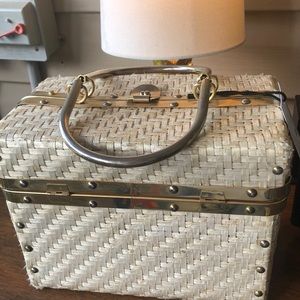 Vintage straw and brass bag.